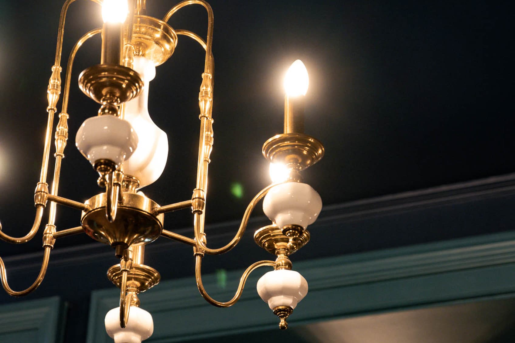 The gold chandelier hanging in the lobby, shows the extravagant the villa once had