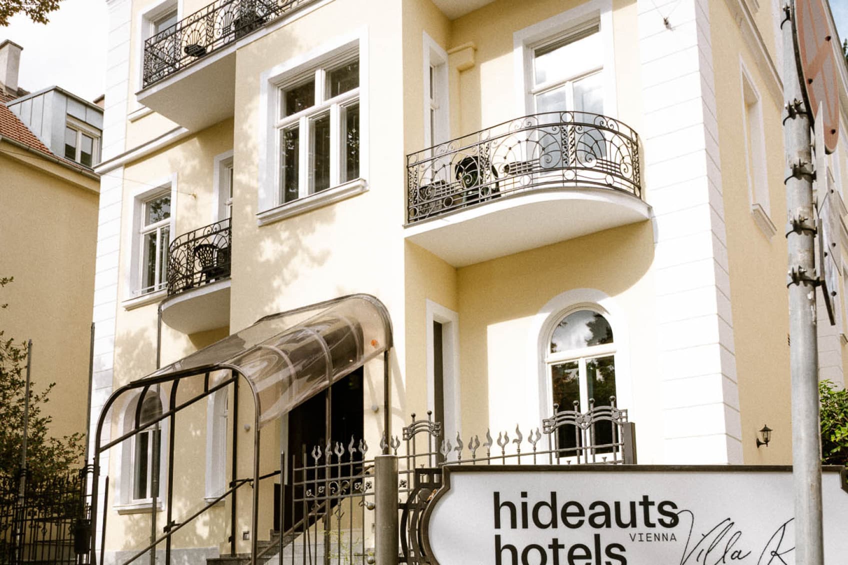 Shown is the villa from its outside front side. You can see the seeveral balconys as well as the name in front